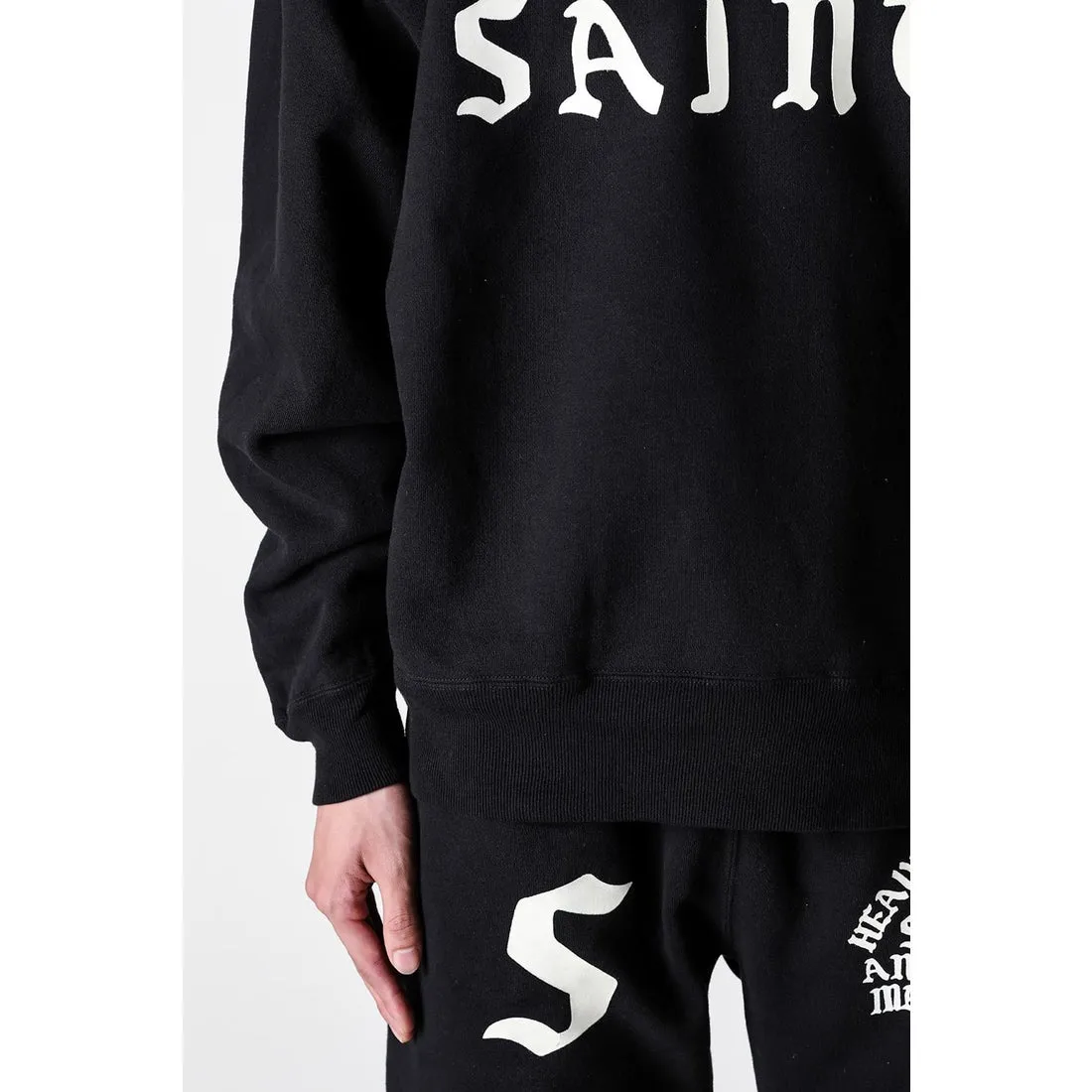 SAINT Mxxxxxx CREW SWT/IT'S SAINT/BLK Flocked SAINT sweatshirt Black S-XL ⚠️Note: This is flocking printing, not glue or crack paste. Don’t buy what you see in the picture. Short and loose fit. Both front and rear necklines are curved. Electrostatic flocking printing technology. Correct accessories. Fruit main mark/little angel anti-counterfeiting label.